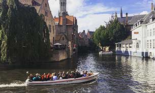 Canal boat in Bruges.
