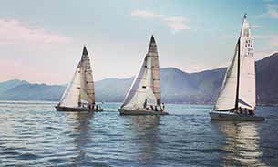 Yachts sailing on a lake