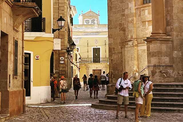 People in a central square of historic Ciutadella