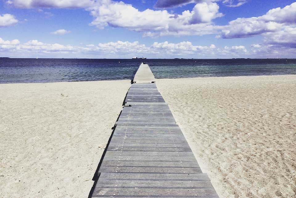 Wooden walkway on a deserted beach