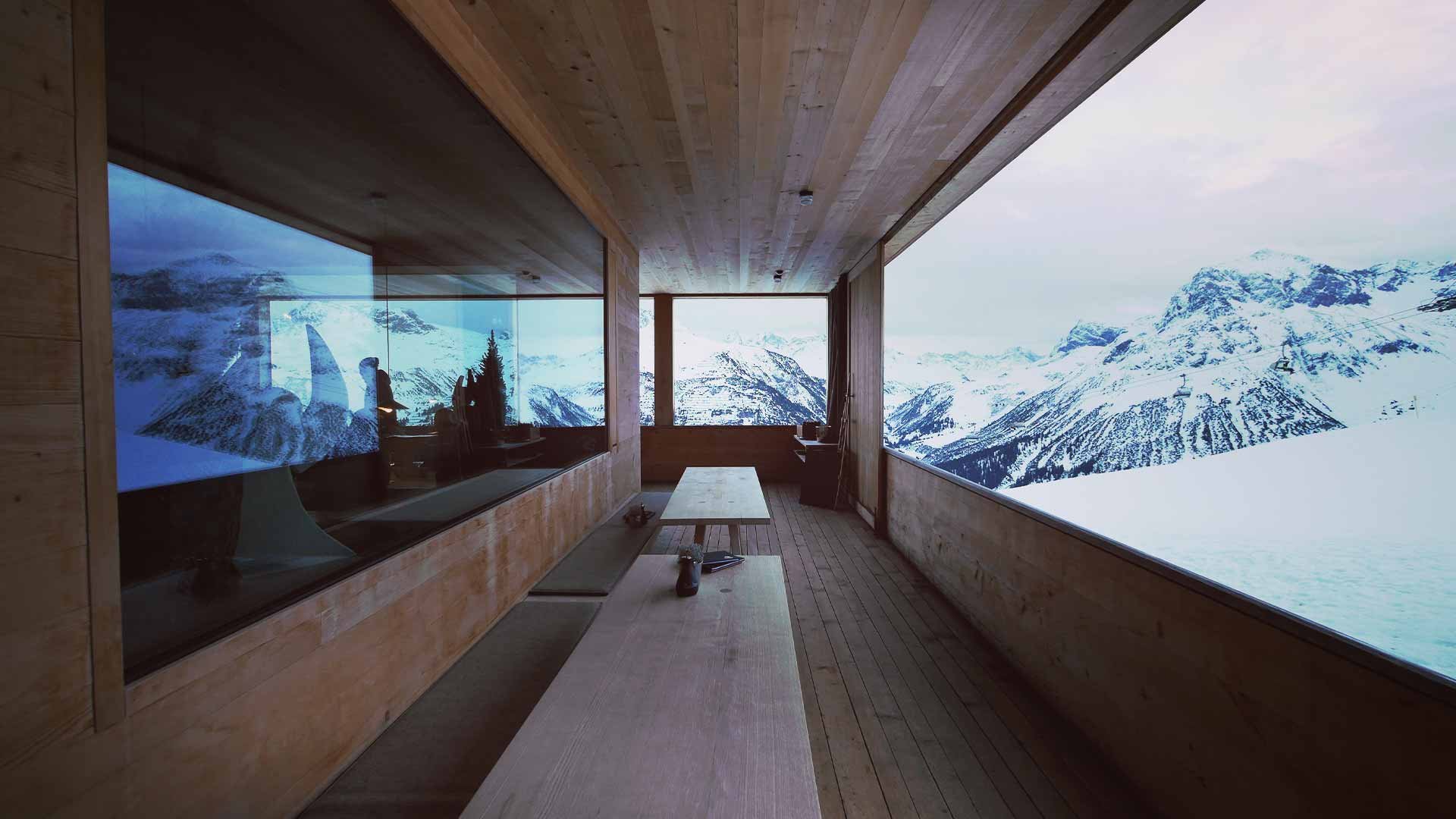 Terrace on a mountain hut in the snow