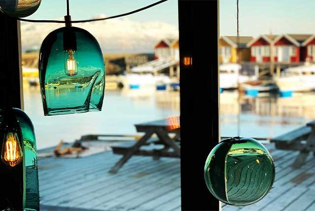 Ornate lighting in front of a window in the Arctic
