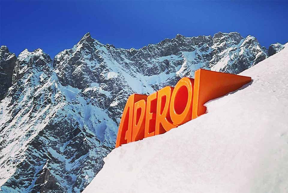 Aperol sign on roof of an igloo in the mountains