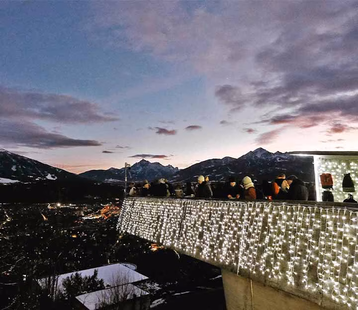 An illuminated terrace at a christmas market