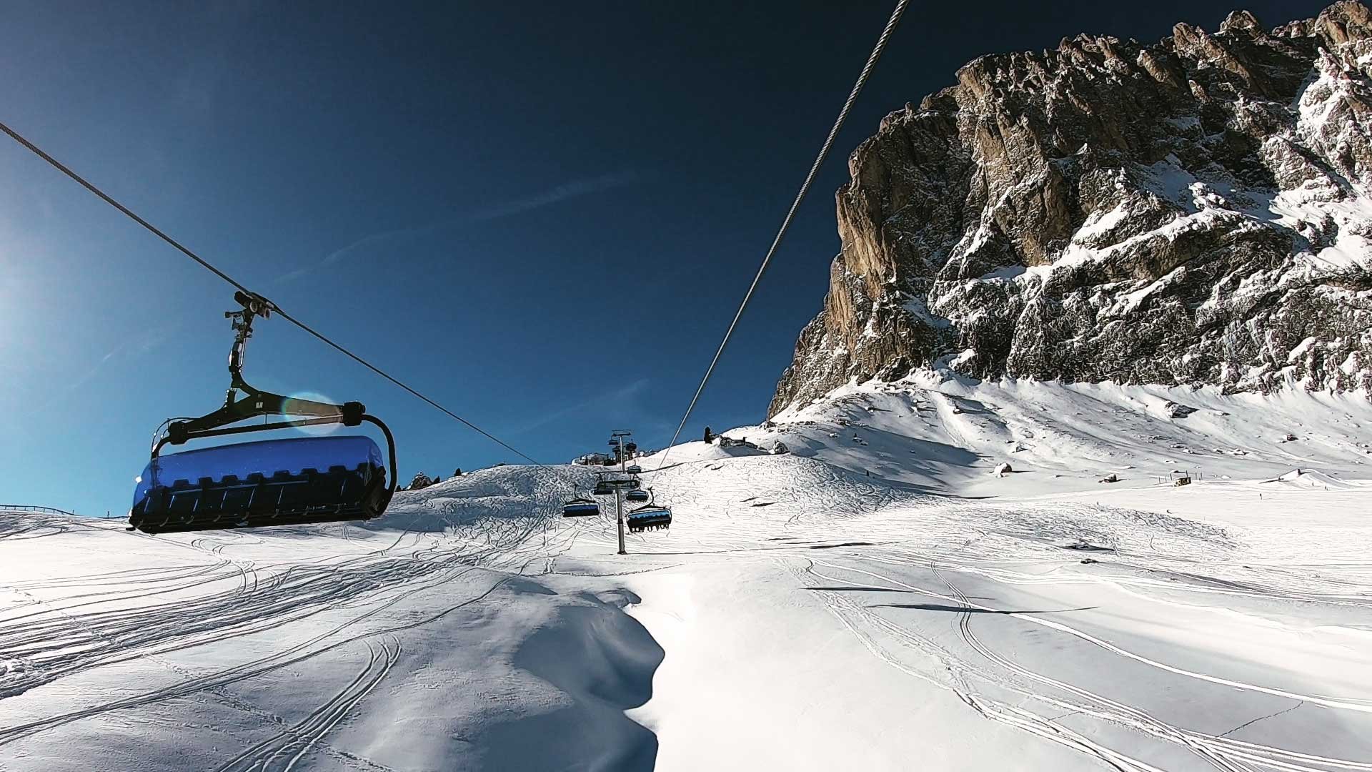 Chairlift above the snow in the Italian Dolomites
