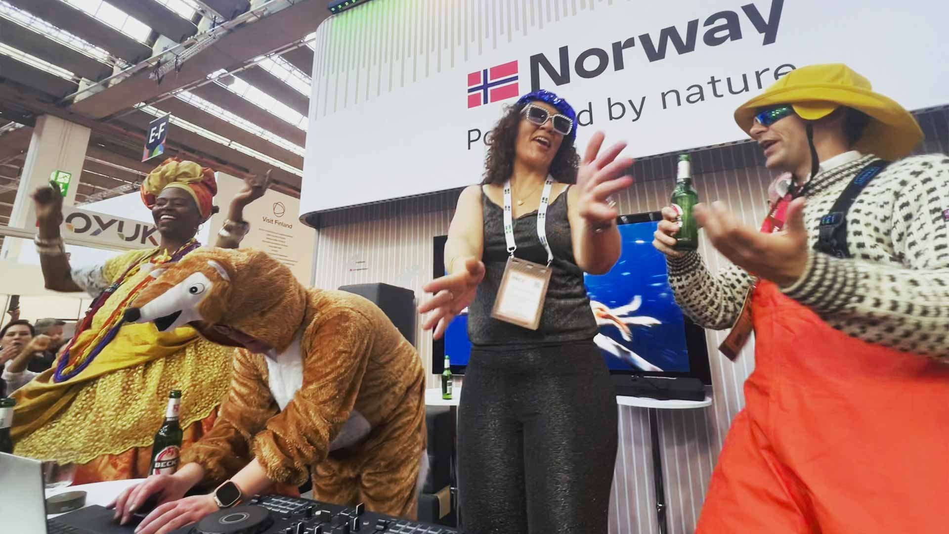 People in fancy dress on a DJ set
