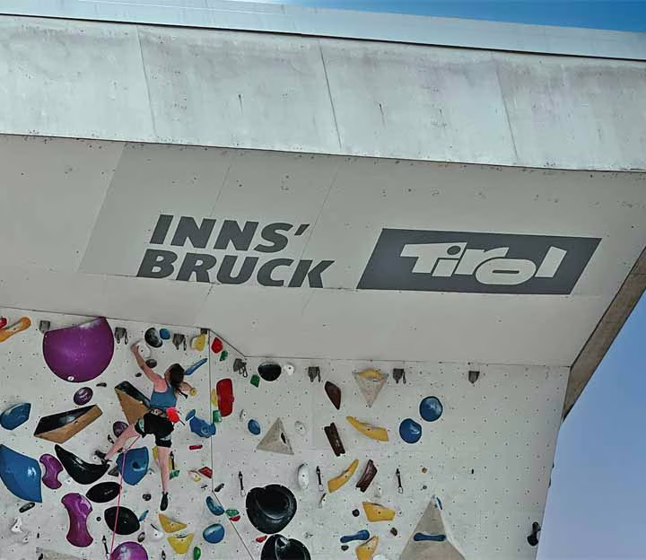 Person on an outdoor climbing wall