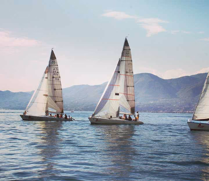 Yachts sailing on lake garda