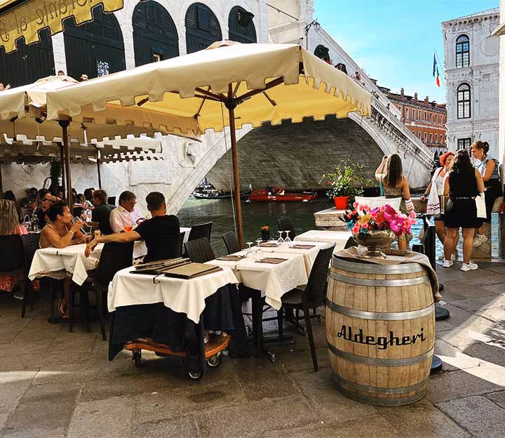 Restaurant terrace next to the Rialto bridge in Venice