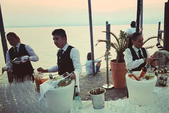 Waiting staff at lakeside bar