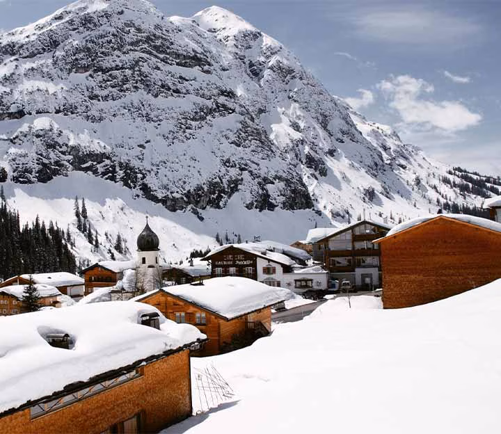 Village in a mountain valley in snow