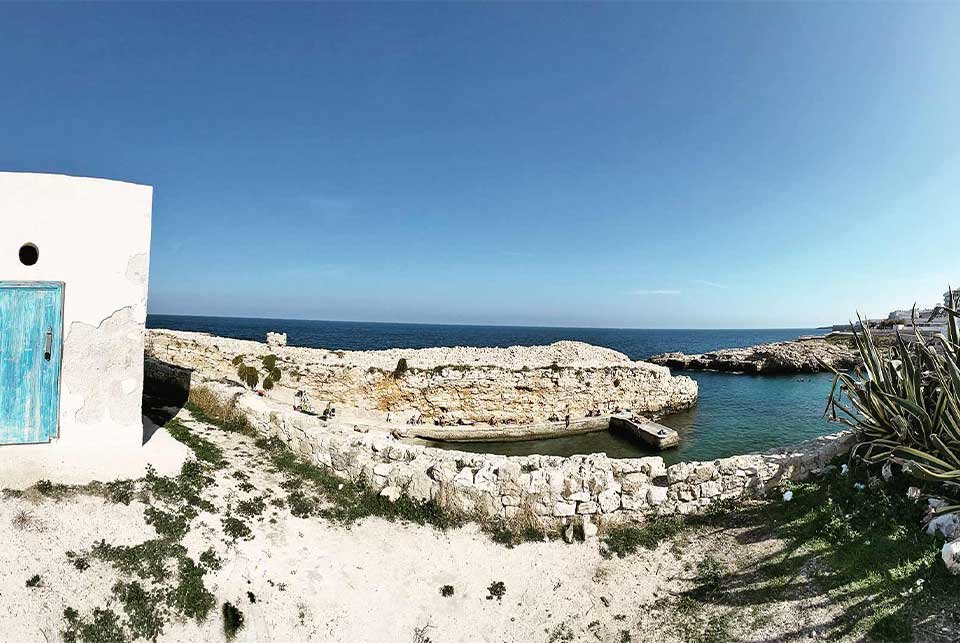 White-washed building on the coast of Italy