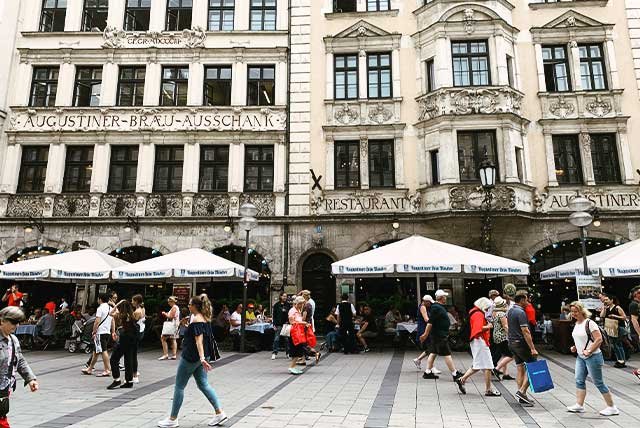 Umbrella dining on a shopping street in Munich