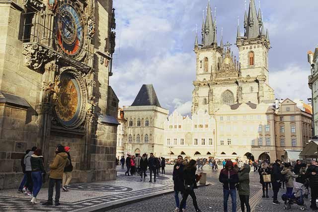 People walking in Wenceslas square in Prague