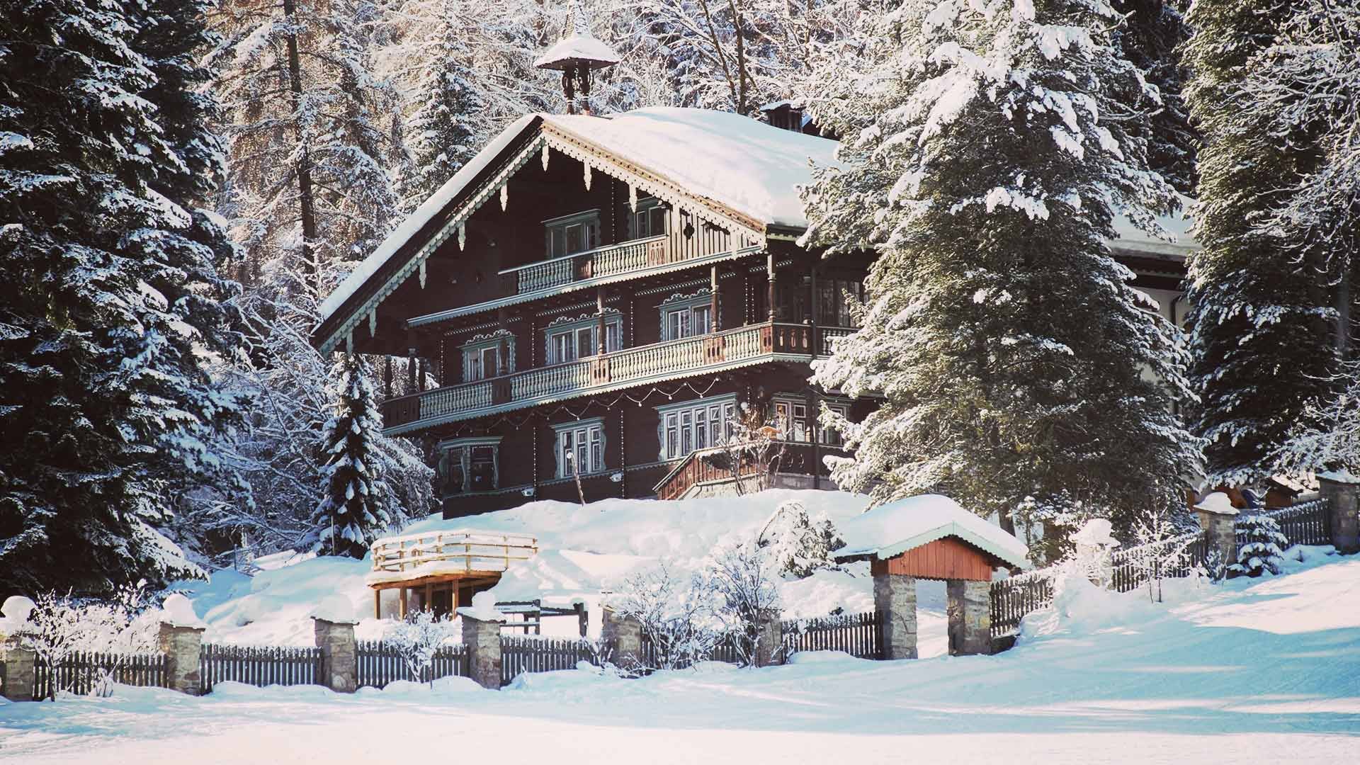 A historic villa in a snowy forest