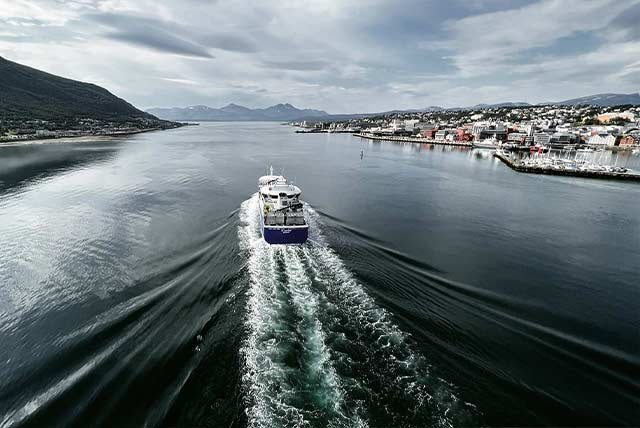 Boat sailing past Tromso