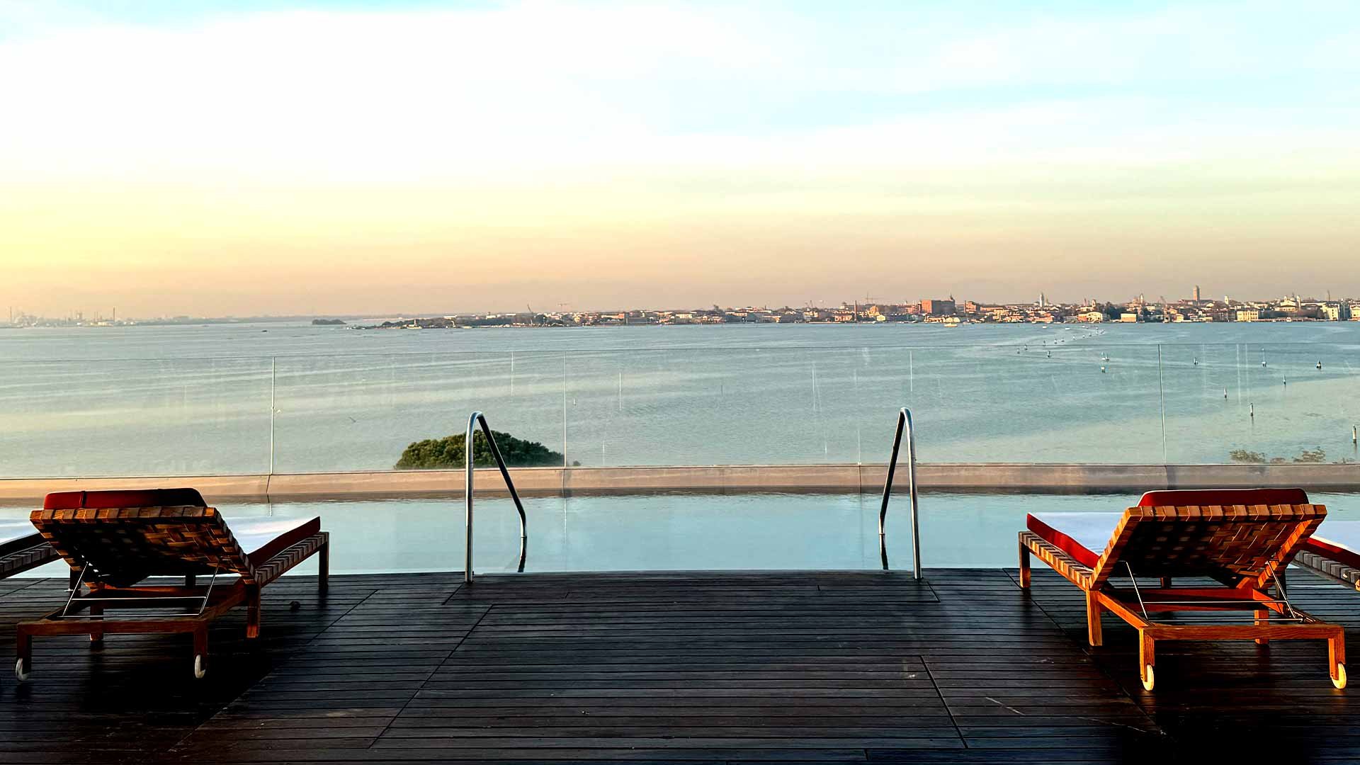 Sunset over a swimming pool at the Venice Lagoon